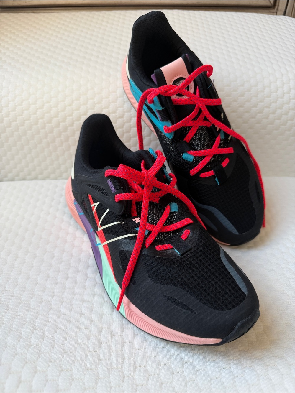 New Balance Women's Black Sneakers with Pink, Teal & Red Accents